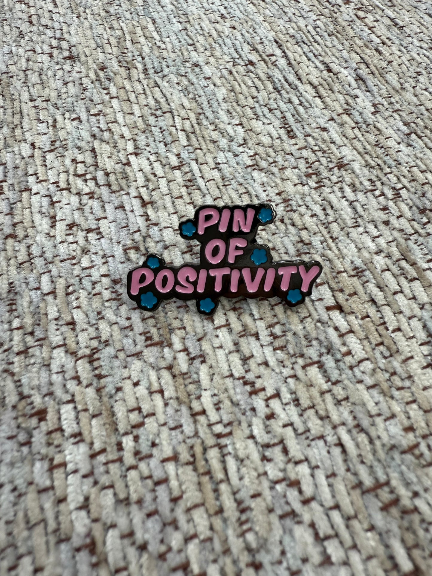 Pin of positivity